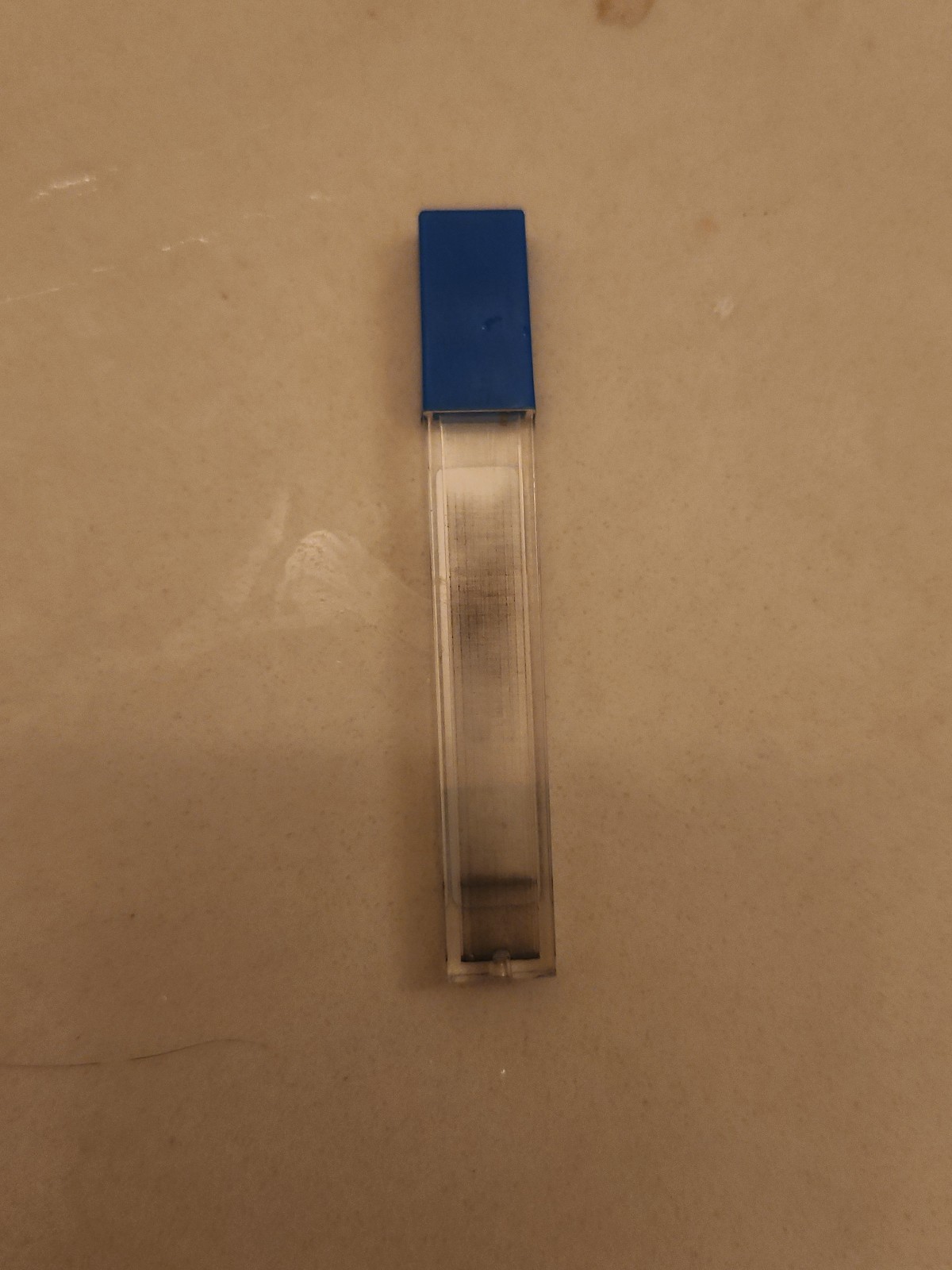 .7 mm mechanical pencil lead case blue top brand is BAZIC