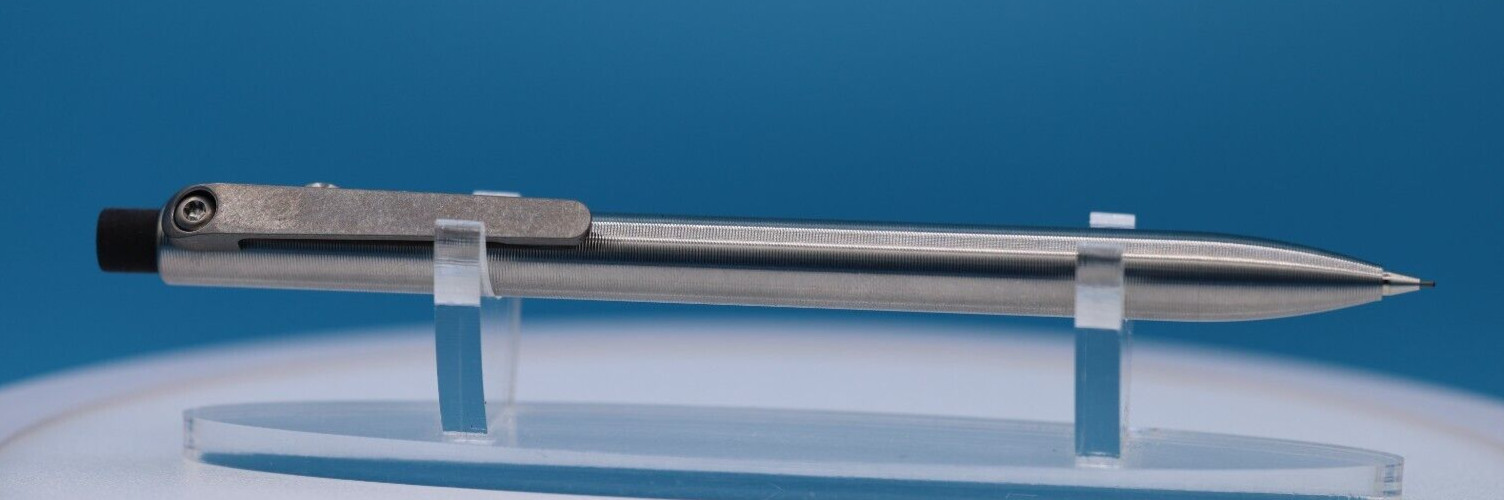Tactile Turn Titanium Pencil with Side Click and Clip – 0.5mm Lead w/extras