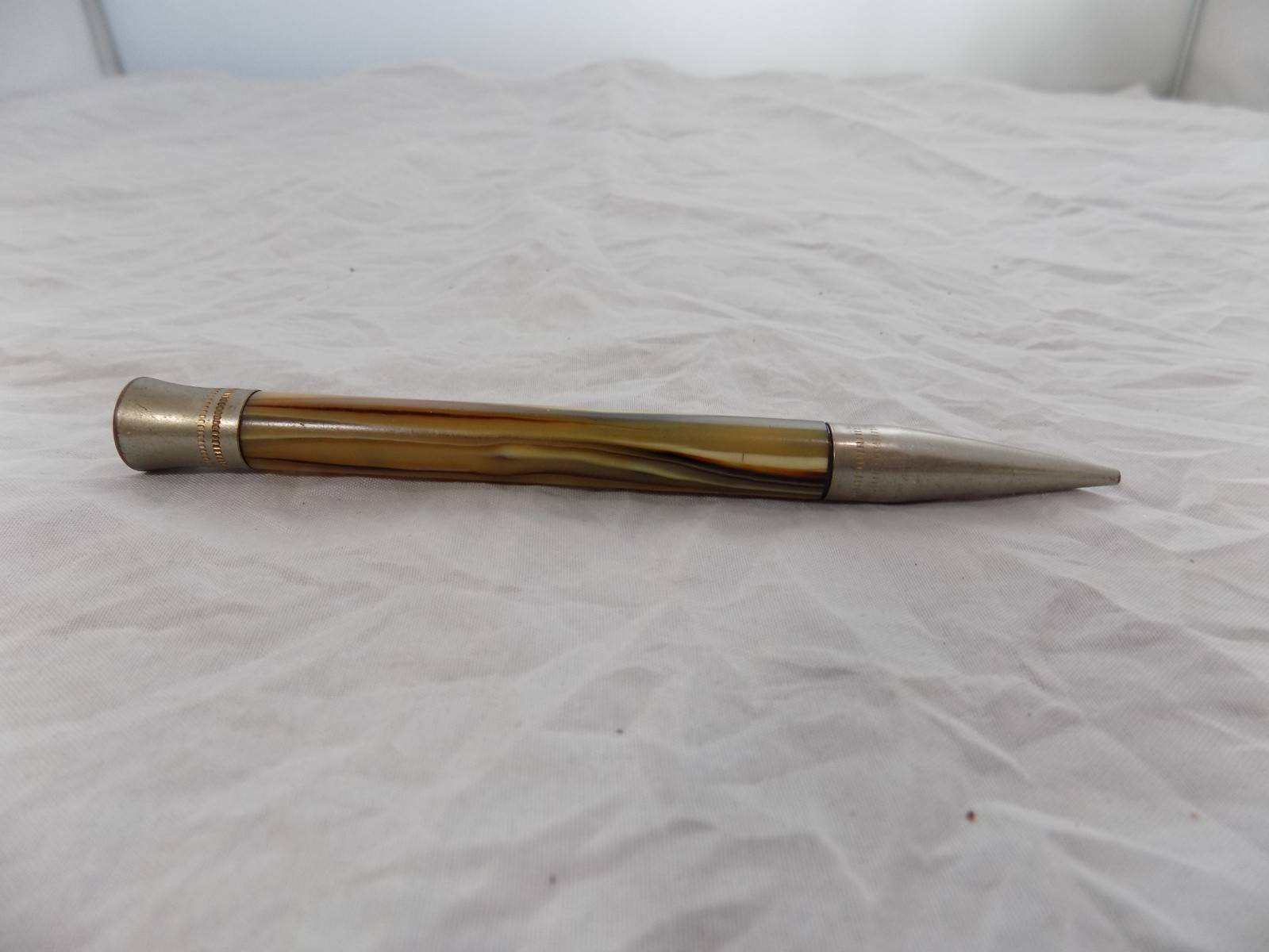 vintage celluloid mechanical pencil the letter M or W etched in the top