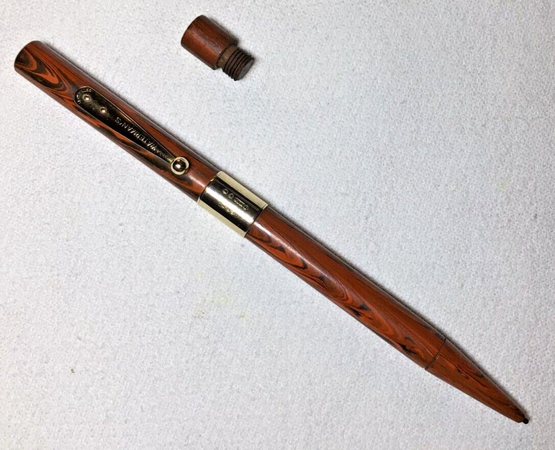 Waterman Pencil Red Ripple 52 1/2 With 9K Gold Band Excellent Working Condition.