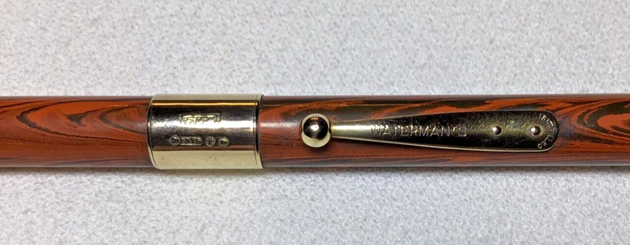 Waterman Pencil Red Ripple 52 1/2 With 9K Gold Band Excellent Working Condition.