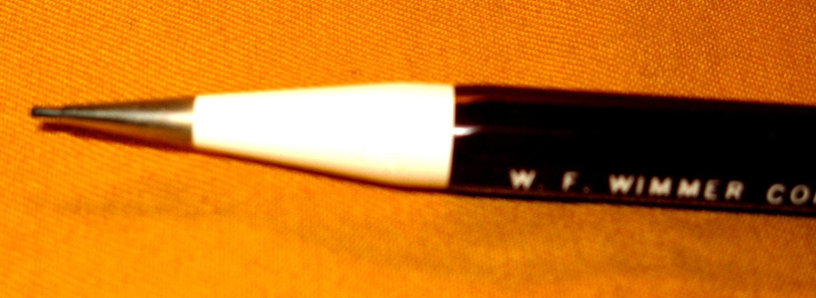 NEW-NEVER USED MAROON/WHITE 76 AUTOPOINT MECHANICAL PENCIL W/W.F.WIMMER CO. ADV.