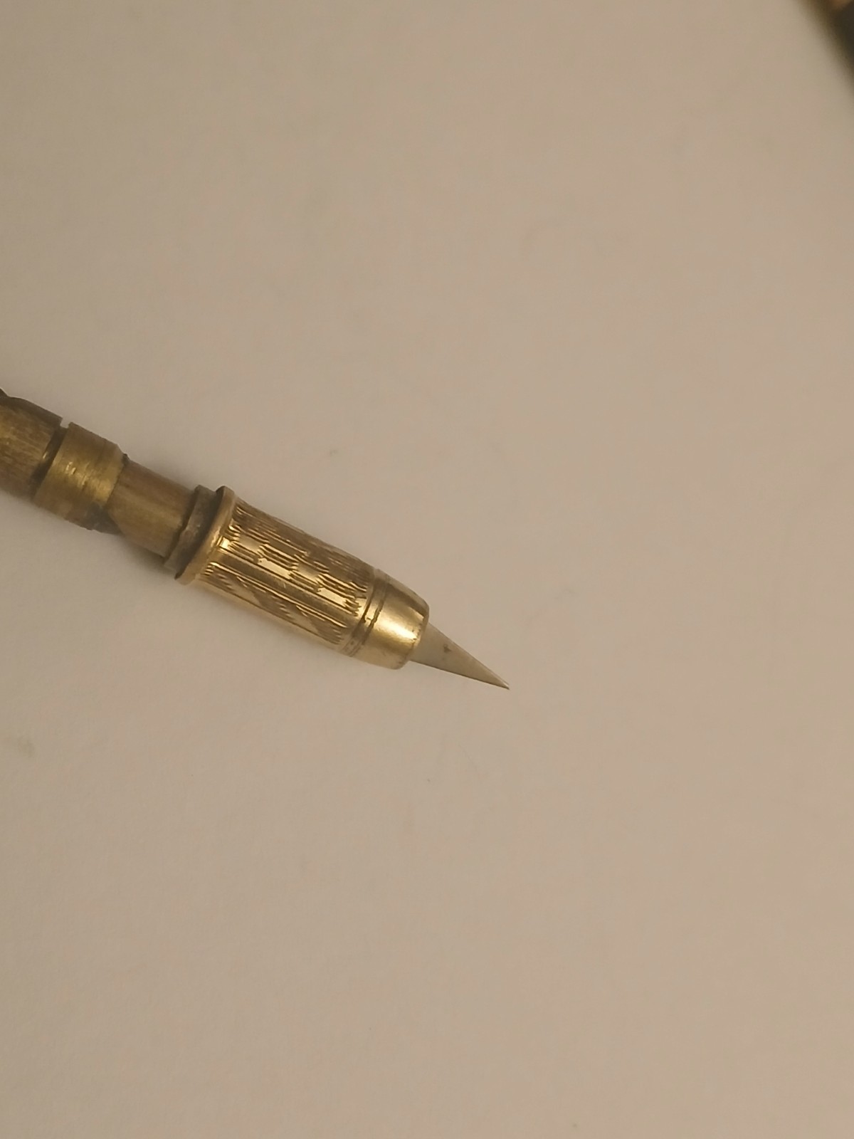 ANTIQUE GOODYEARS MECHANICAL PENCIL PARTS.