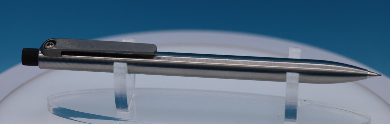 Tactile Turn Titanium Pencil with Side Click and Clip – 0.5mm Lead w/extras