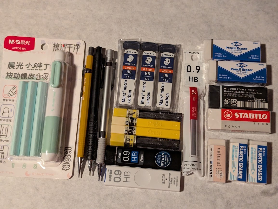 23 Piece Set 0.9mm Mechanical Pencils, Refill Lead, Erasers, Bag, Desk Holder