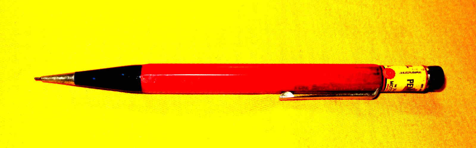 PRE-OWNED 76 AUTOPOINT MECHANICAL PENCIL MAROON PENCIL W/PENNZOIL ADV.
