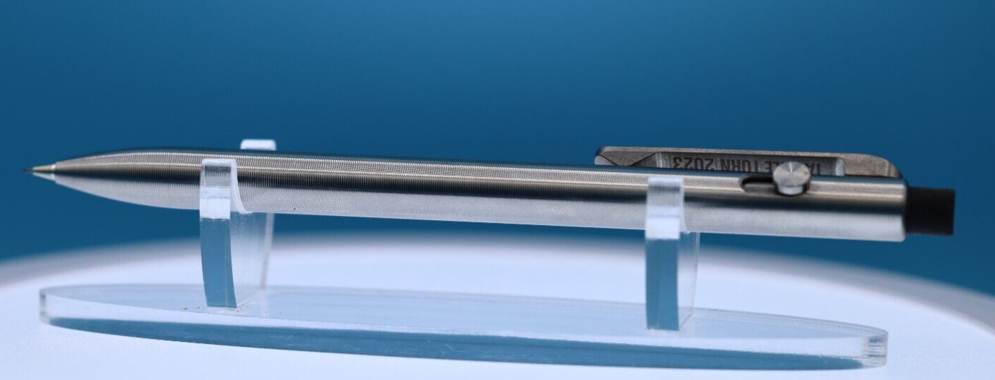 Tactile Turn Titanium Pencil with Side Click and Clip – 0.5mm Lead w/extras