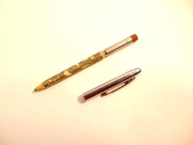 older unlabeled mechanical pencil with jeweled pocket clip & filigree accent