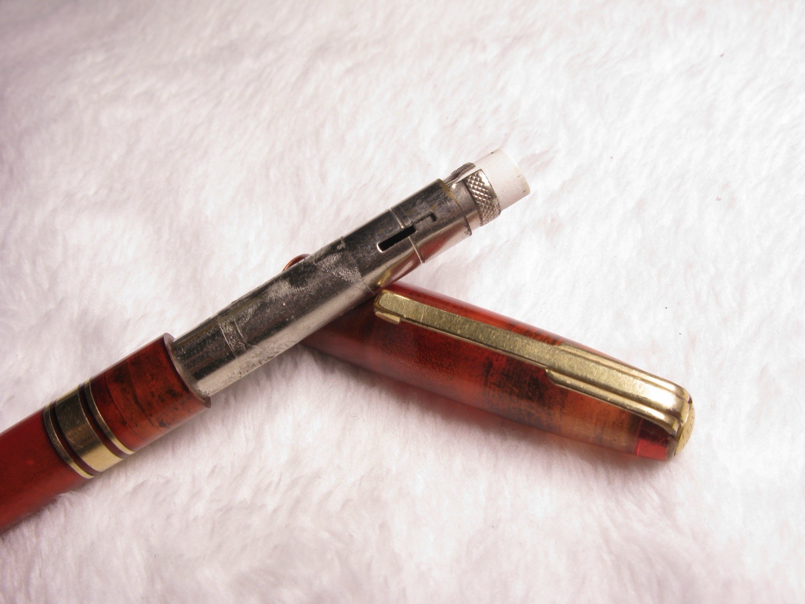 Waterman’s Clear Red/Orange tint with Gold Tone metal Vintage Mechanical Pencil