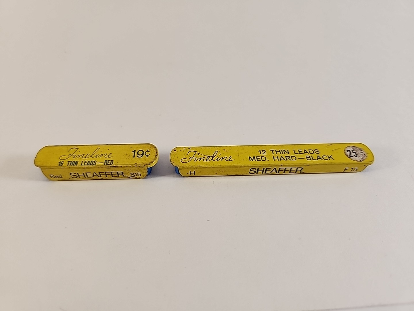 Two Tins Vintage FINELINE THIN LEADS- 12 Med. Hard Black (Partial), 16 Red