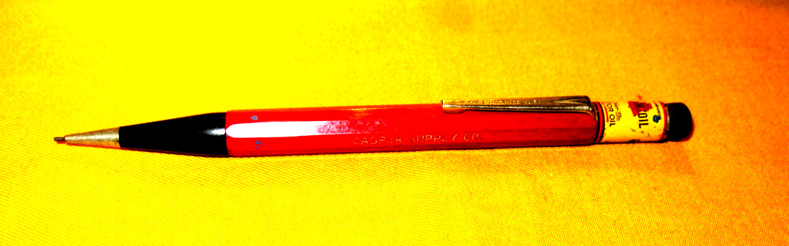 PRE-OWNED 76 AUTOPOINT MECHANICAL PENCIL MAROON PENCIL W/PENNZOIL ADV.