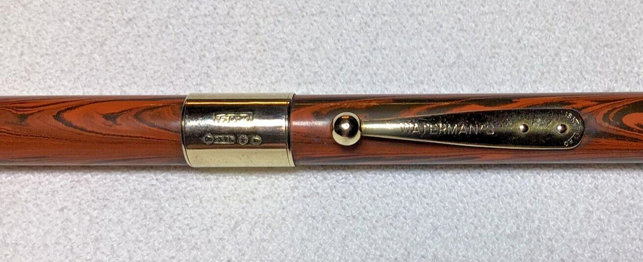 Waterman Pencil Red Ripple 52 1/2 With 9K Gold Band Excellent Working Condition.