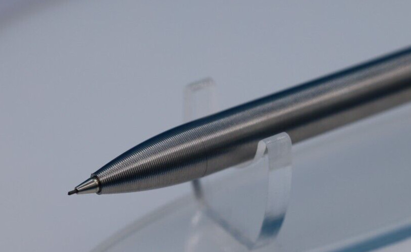 Tactile Turn Titanium Pencil with Side Click and Clip – 0.5mm Lead w/extras