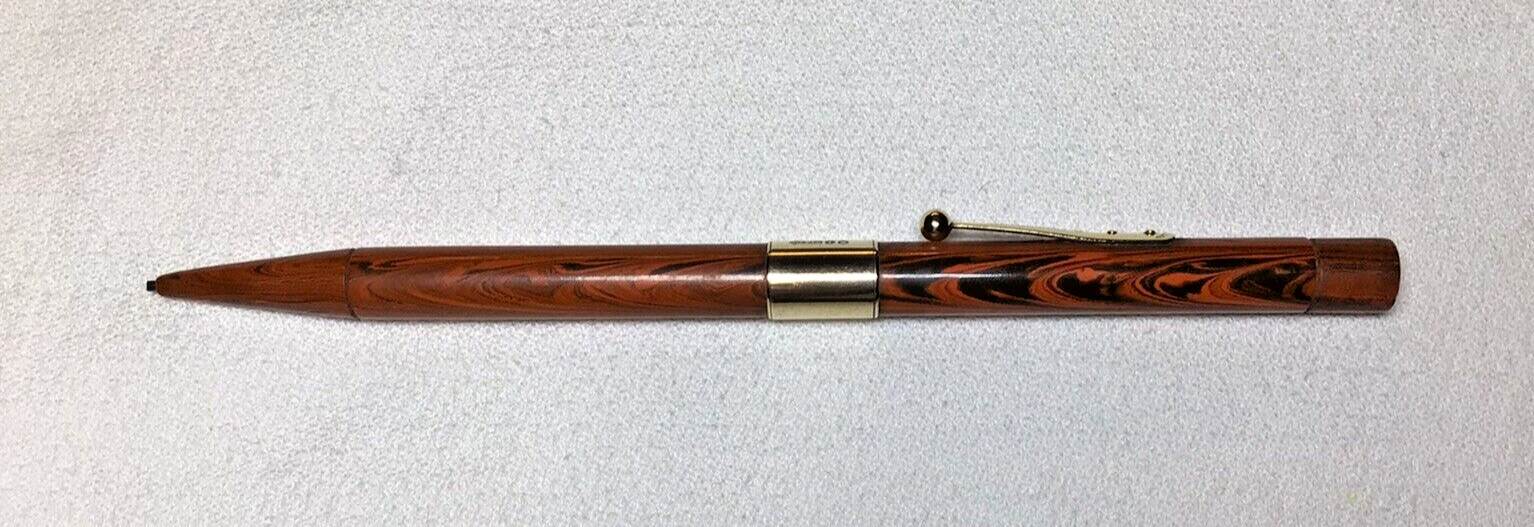Waterman Pencil Red Ripple 52 1/2 With 9K Gold Band Excellent Working Condition.