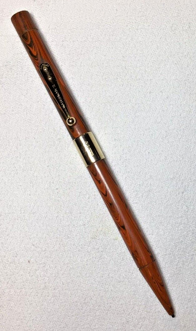 Waterman Pencil Red Ripple 52 1/2 With 9K Gold Band Excellent Working Condition.