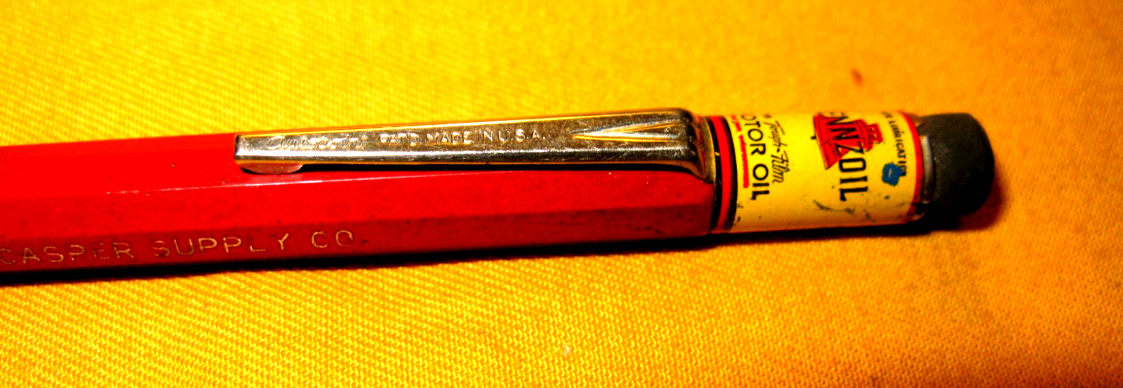 PRE-OWNED 76 AUTOPOINT MECHANICAL PENCIL MAROON PENCIL W/PENNZOIL ADV.