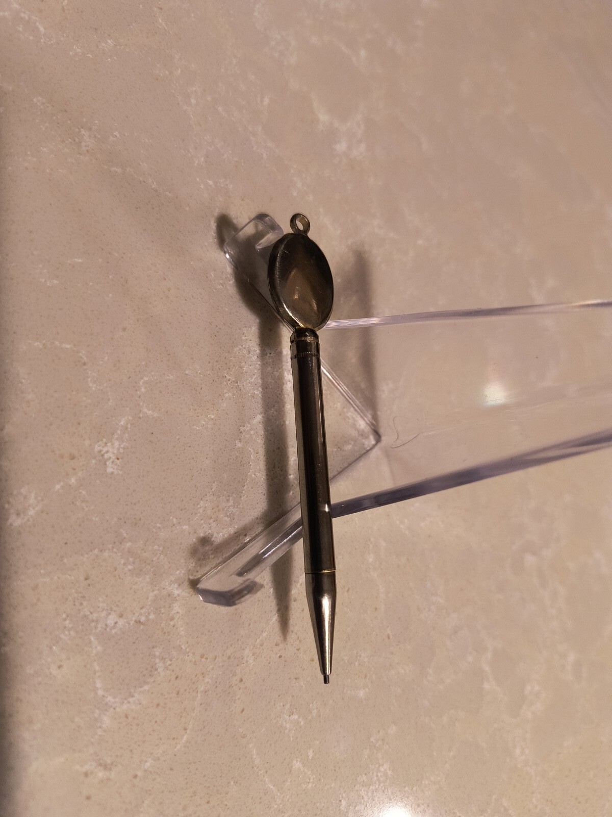 Mini mechanical pencil pendant designed to hold photo. 3″ Long. Nichel Chrome.