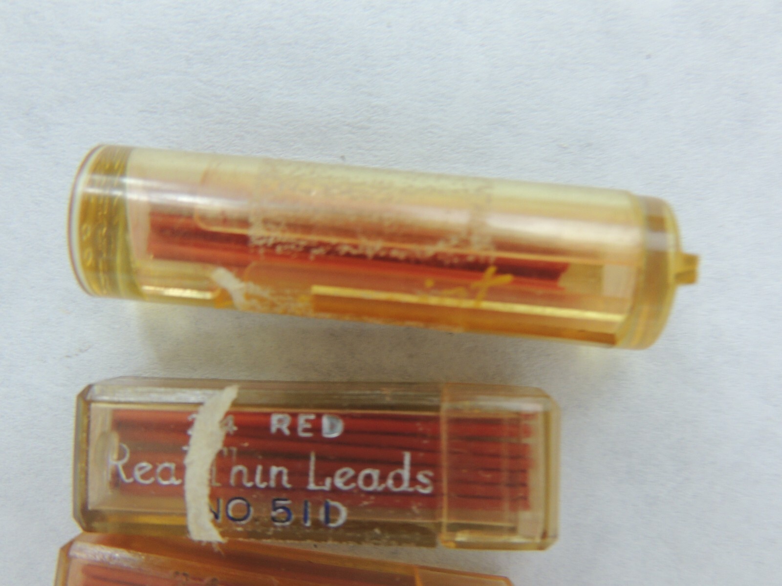Real Thin Leads 3 Red, 2 Dixon Metal Containers – 1 Red, 1 Blue