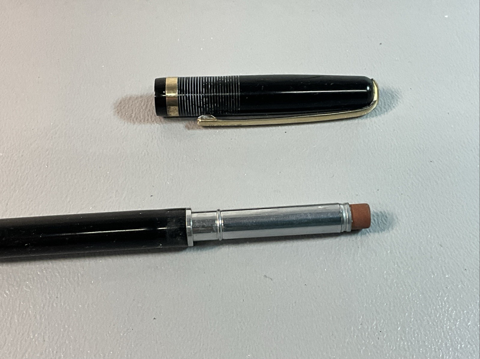 VINTAGE 1930’S MOORE MECHANICAL PENCIL. WORKS, BLACK WITH GOLD TRIM. 5 1/8(S1268