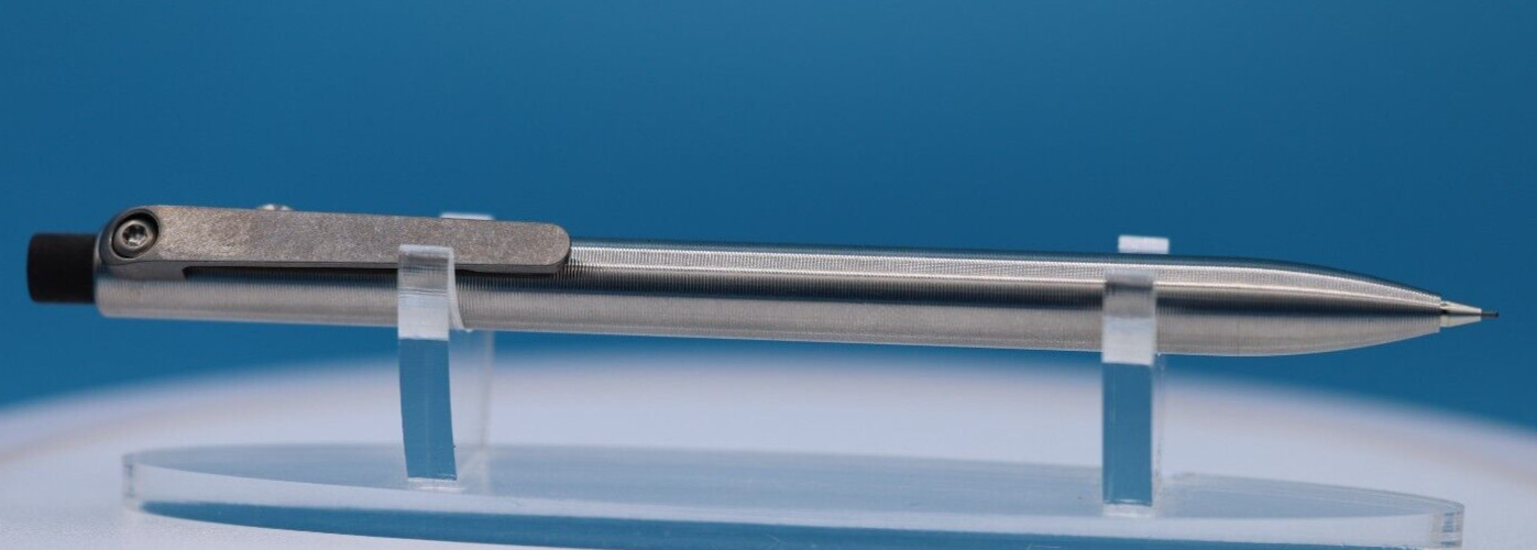 Tactile Turn Titanium Pencil with Side Click and Clip – 0.5mm Lead w/extras