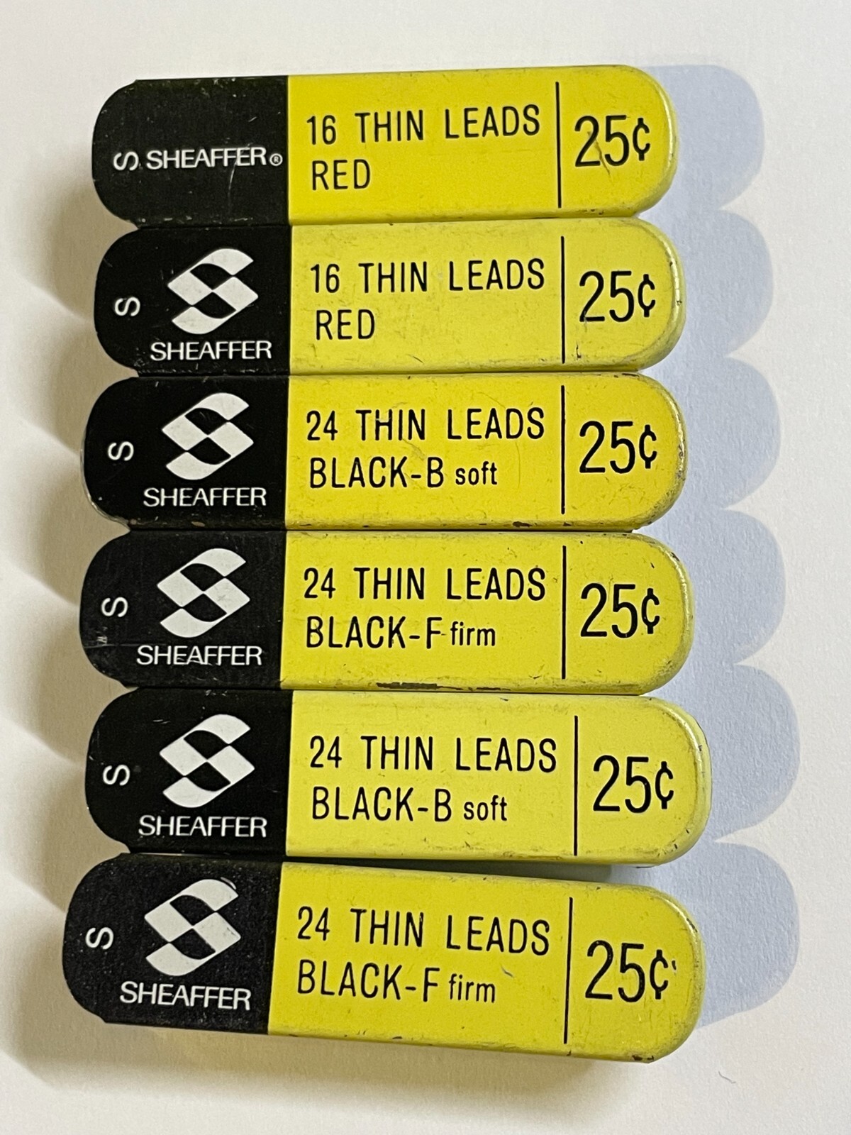 VINTAGE SHEAFFER Thin Black, Red Leads – Lot of six containers – NEW