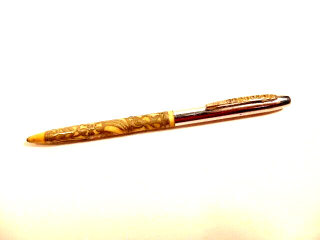 older unlabeled mechanical pencil with jeweled pocket clip & filigree accent