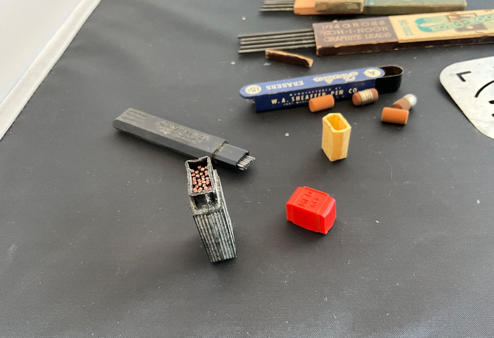 MIXED LOT OF VINTAGE MECHANICAL LEADS, ERASING SHIELD, ERASERS W/VINTAGE TIN