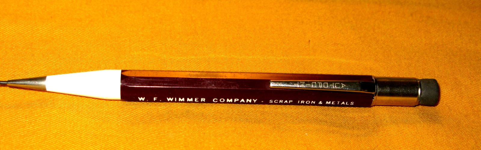 NEW-NEVER USED MAROON/WHITE 76 AUTOPOINT MECHANICAL PENCIL W/W.F.WIMMER CO. ADV.